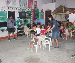 Employees Conducting Games for the Children